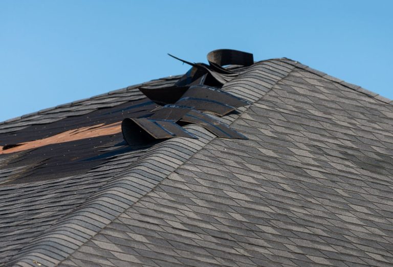 shingles coming of after storm damage, Roseville, MN